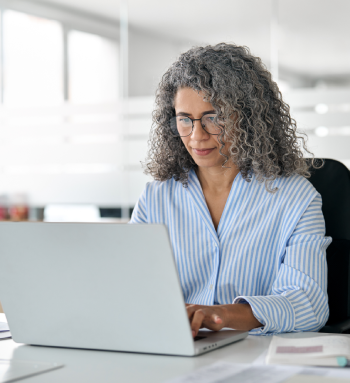 Person looking at a laptop